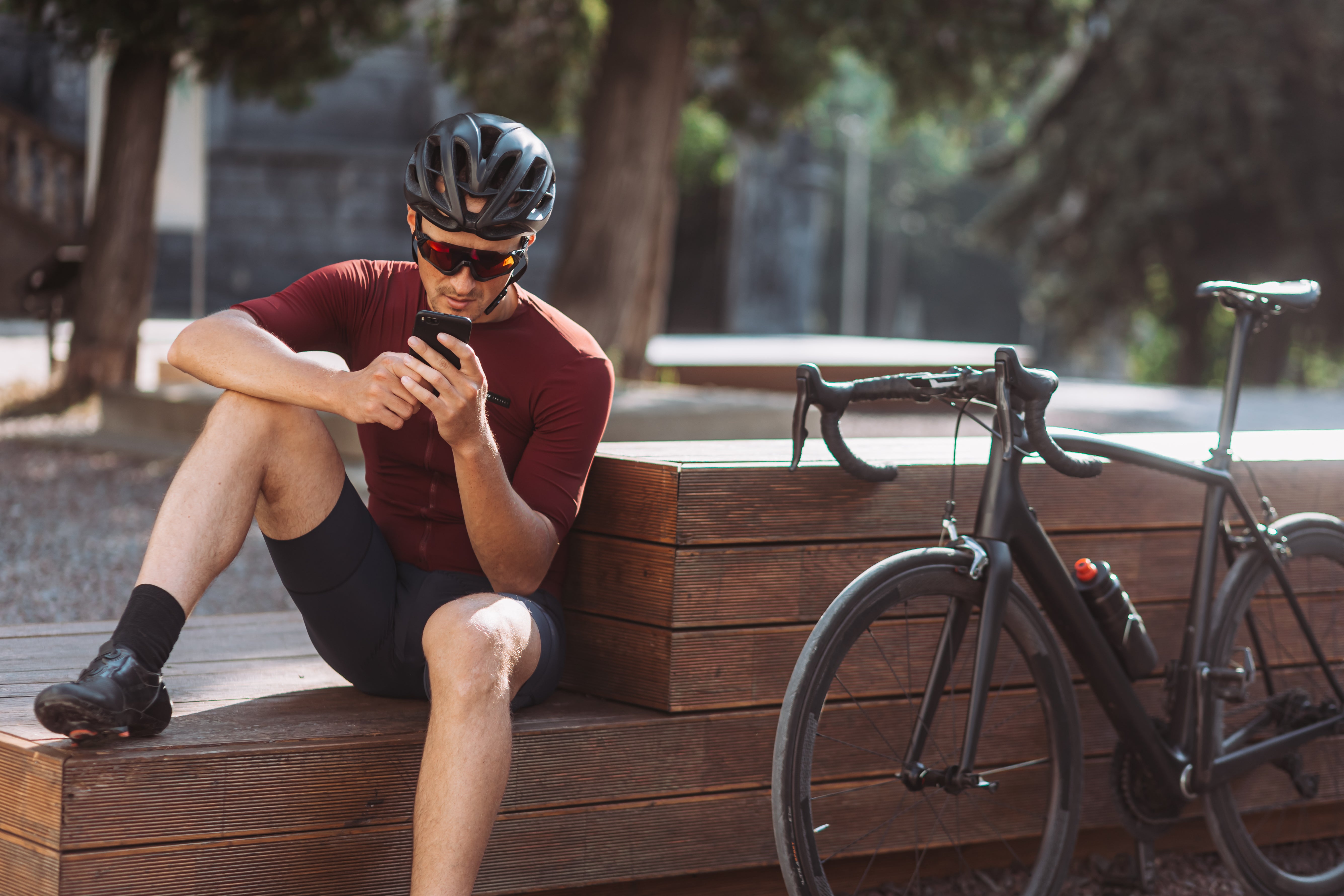 male-athlete-in-sportswear-using-smartphone-after-2023-11-27-05-12-29-utc.jpg